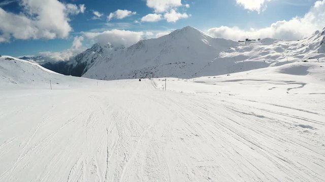POV View Of Snowboarding On Snow Covered Landscape With Snowy Mountains 4K
