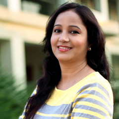 Smiling young woman at outdoors