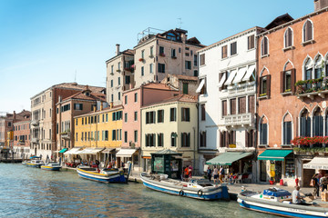 Obraz na płótnie Canvas VENICE, ITALY - June 30, 2016. Beautiful view of water street an