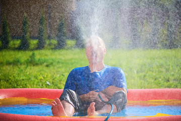 Man in a spray of water