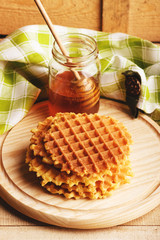 Waffles and glass with honey