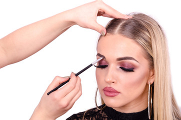 Fototapeta premium Hand beautify eyebrow, head and face of beautiful girls