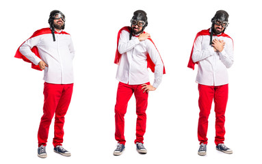 Crazy superhero man with shoulder pain