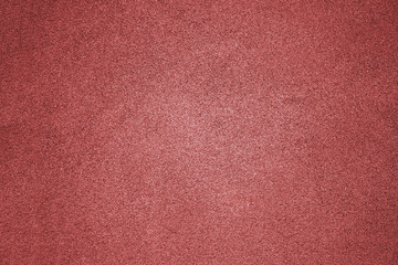 Red wall texture, color plaster surface, abstract background