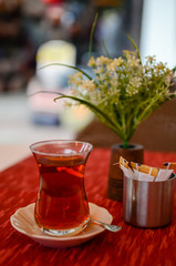 a clear glass of Turkish tea
