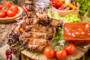 grilled beef steak on the grill on a wooden table