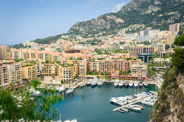 Monte Carlo harbour city panorama. View of luxury yachts and apartments in harbor of Monaco