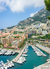 Monte Carlo harbour city panorama. View of luxury yachts and apartments in harbor of Monaco