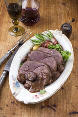 Traditional German Roast Venison with Vegetable in Deer Sauce on a plate