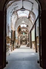 Jail hallway with locked doors.