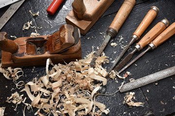 old tool for manually rendering wood