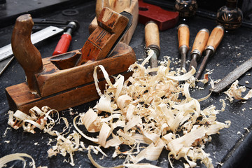 old tool for manually rendering wood