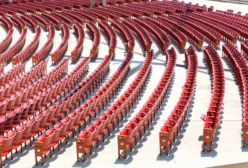 Empty open air theater seats.