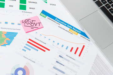 Office desk table with business paper, pen, postit, notebook, ke