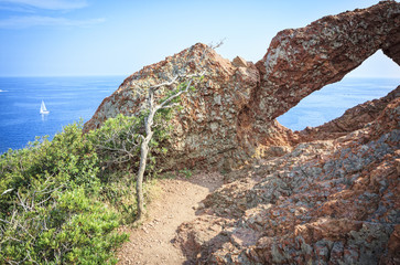 Hole in the stone at the peninsula Cap du Dramont near Frejus
