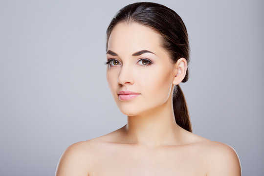 Beauty portrait of young girl with nude make-up
