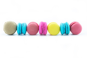 colourful french macaroons or macaron on white background