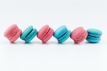 colourful french macaroons or macaron on white background