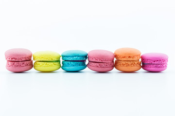 colourful french macaroons or macaron on white background