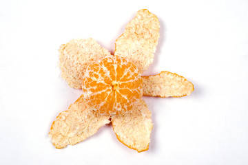 Peeled tangerine on white