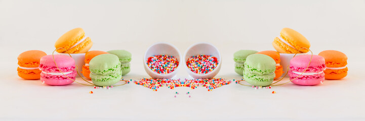 Macaroons - colorful set with candy dots on white  - sweet bakery - wide panoramic image
