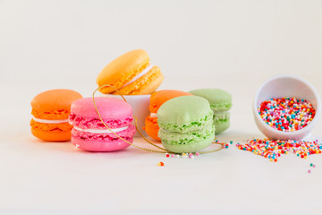Macaroons - colorful set with candy dots on white  - sweet bakery and pastry. Selective focus. Copy space.