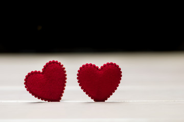 two red hearts on old wooden,valentine day