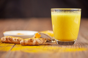 Turmeric golden milk with root and powder - 134132540