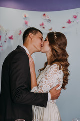 A beautiful bride and handsome groom during wedding registration