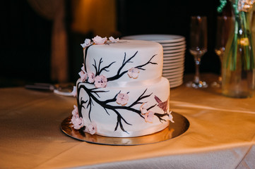 wedding cake on the wooden plate
