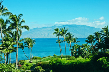 Fototapeta na wymiar A view from Maui Island, Hawaii looking out over the bay to another Island 