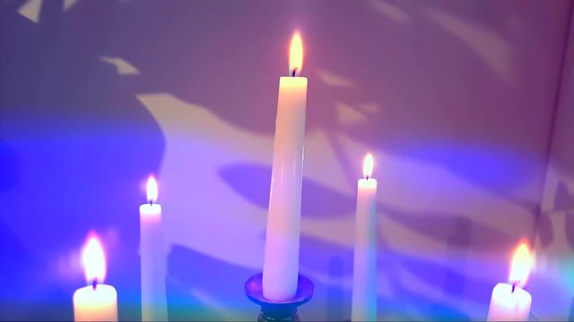 Candles Flaming in Candlestick