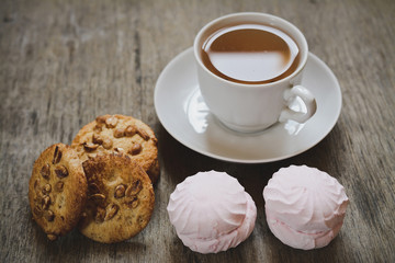 biscuits Cookies, zephyr and a cup of hot tea for breakfast