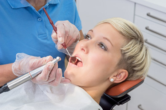 Pretty young woman at the Dentist