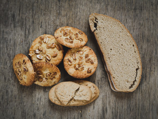 Wheat products: Cookies and bread closeup on a desk