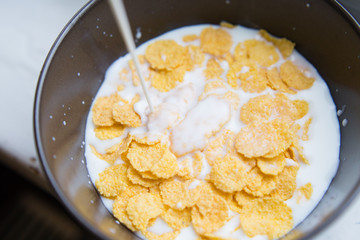Bowl with Cornflakes and Milk. Healthy Breakfast.