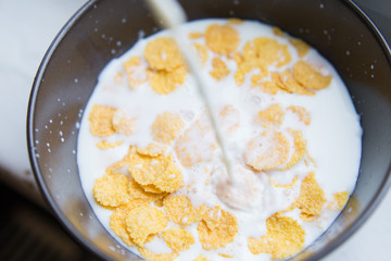 Bowl with Cornflakes and Milk. Healthy Breakfast.