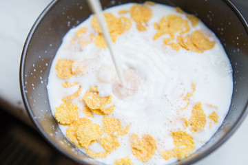 Bowl with Cornflakes and Milk. Healthy Breakfast.