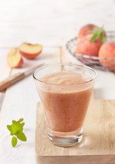 peach smoothie in glass