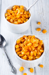 Boiled corn kernels in white cups