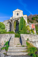Fototapeta na wymiar Sanctuary Madonna della Punta on Lake Maggiore, Maccagno, province of Varese, Italy. The church, also called Madonna del Rosario, is counted among the 72 Marian shrines of the Diocese of Milan