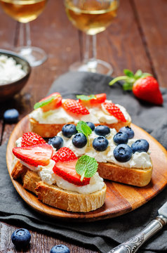 Strawberry and blueberry ricotta sandwiches