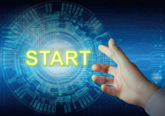 Fototapeta premium Businessman touching start button