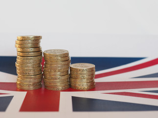 Pound coins, United Kingdom over flag