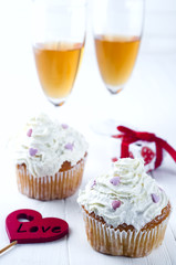 Cupcake with cream and hearts