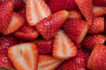 Fresh ripe sliced strawberries
 - Powered by Adobe