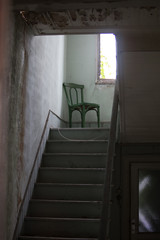 Stairs and chairs in the abandoned building