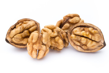 Walnut and walnut kernel isolated on the white background.