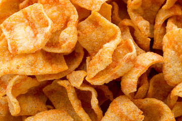 Delicious potato chips closeup becon meat.