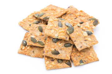 Autumn themed baked crisps with cranberries, nuts and seeds stac